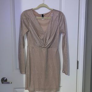 Glittery long sleeve dress.
